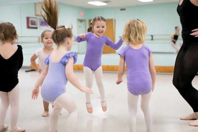 a group of girls dancing