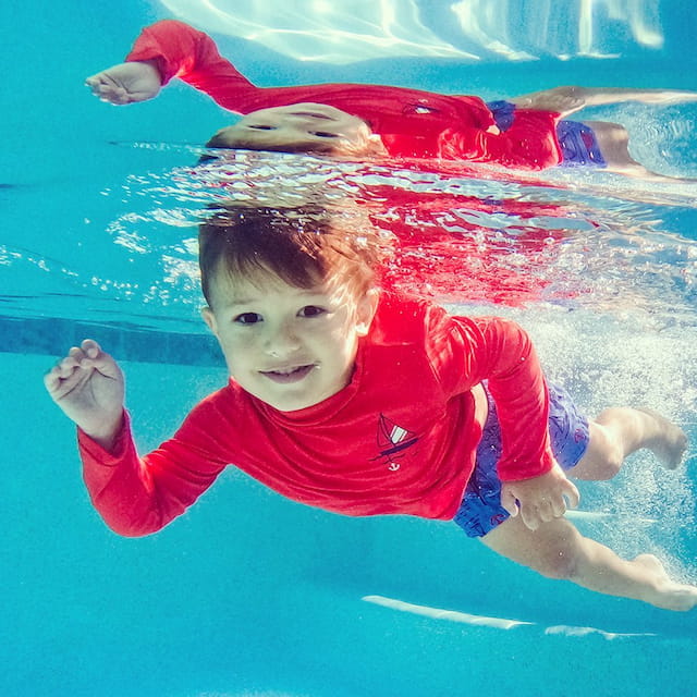 a child in a pool