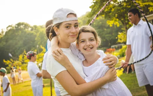 a person holding a child