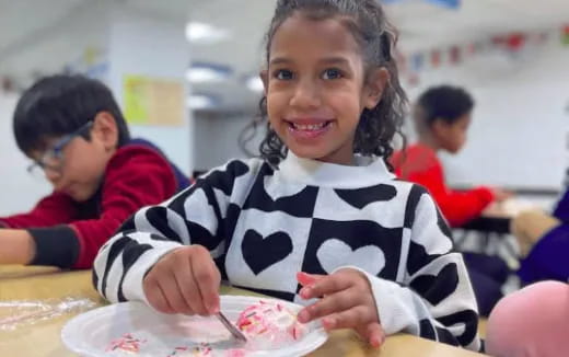 a young girl smiling