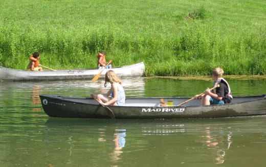 people rowing a boat