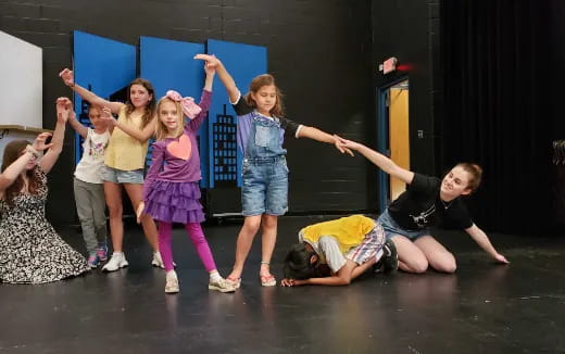 a group of children dancing