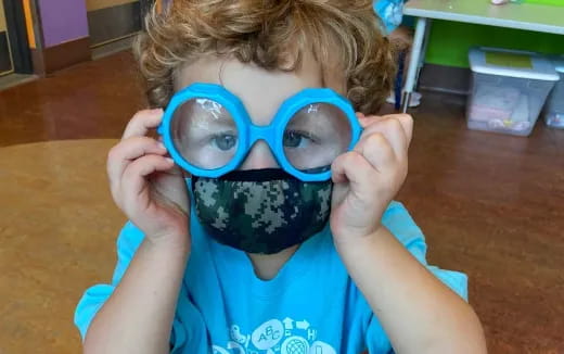 a child wearing goggles