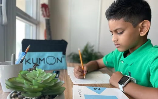 a young boy painting