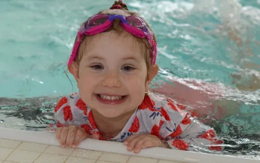 a girl in a pool