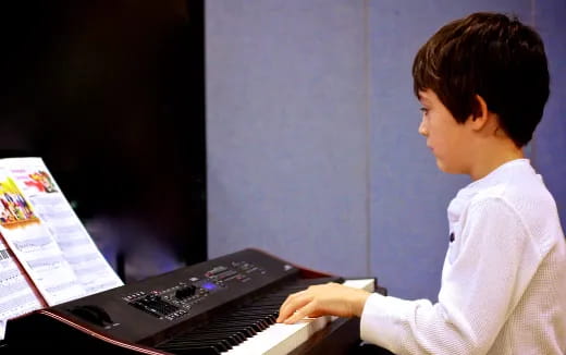 a man playing a piano