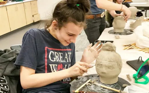 a person painting a skull