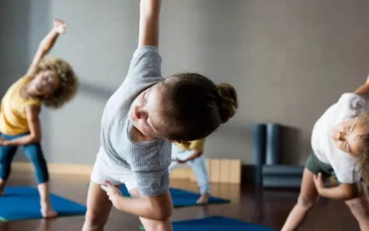 a group of children exercising