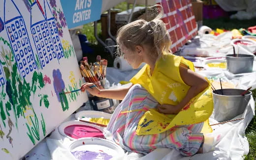 a young girl painting