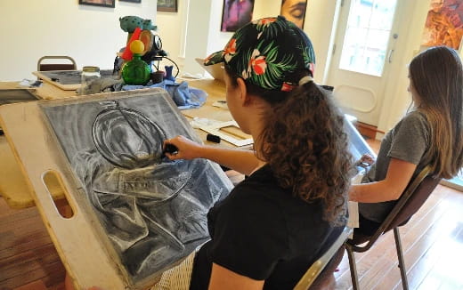 a group of women painting