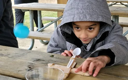 a child wearing a hoodie