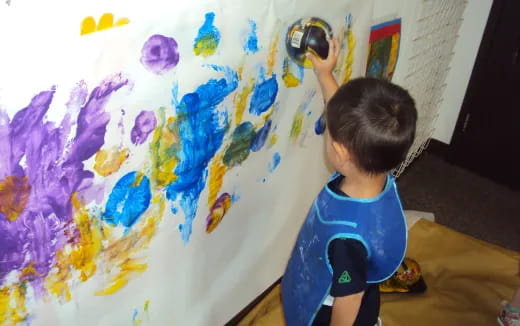 a child painting a picture