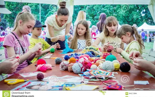 a group of children painting