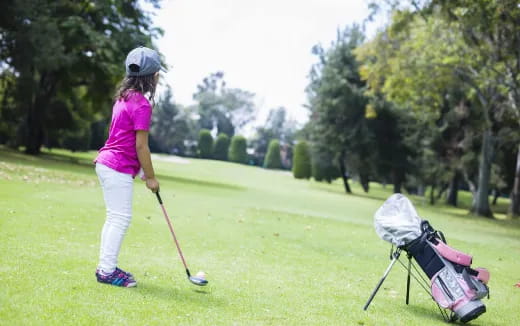 a person playing golf