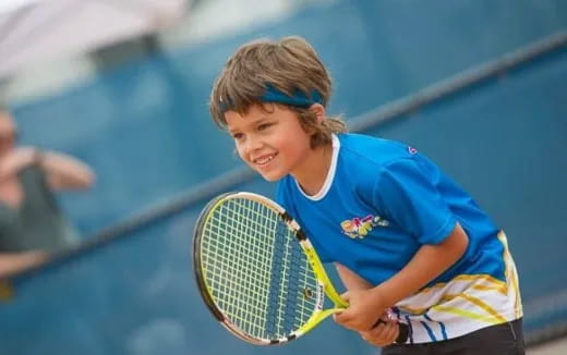 a girl playing tennis