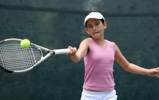 a woman playing tennis