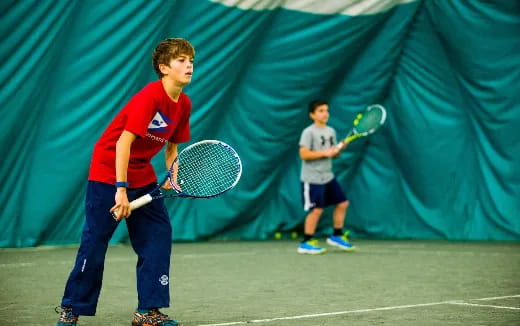 a man playing tennis