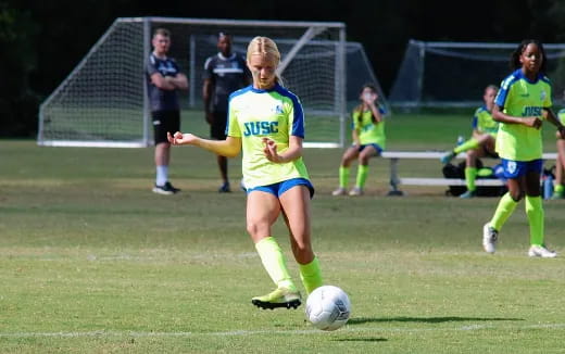 a girl playing football