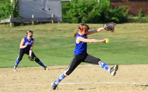 a person catching a baseball