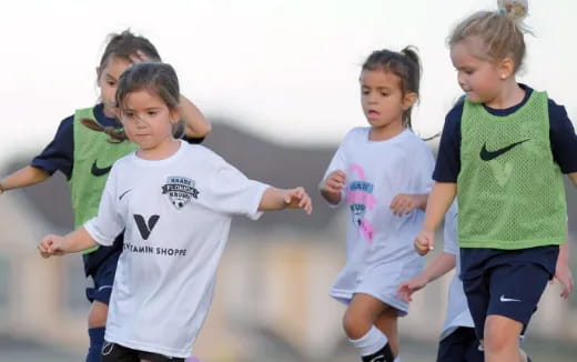 a group of girls running