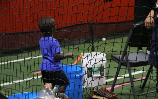 a kid playing baseball