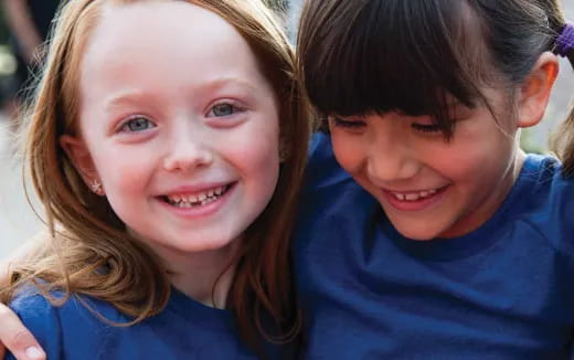 a boy and girl smiling