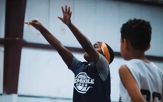 a man shooting a basketball