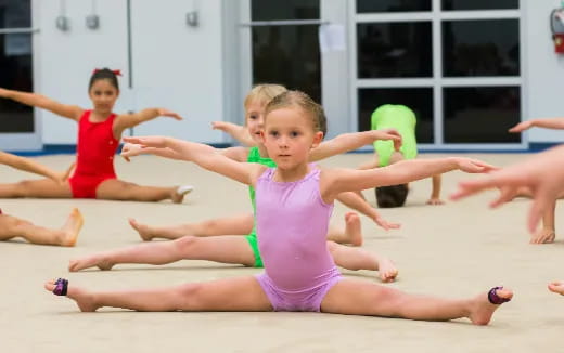 a group of children exercising