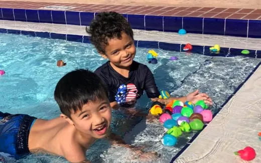 two boys in a pool