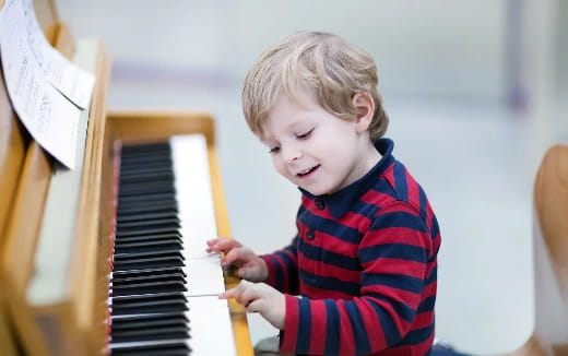 a child playing a piano