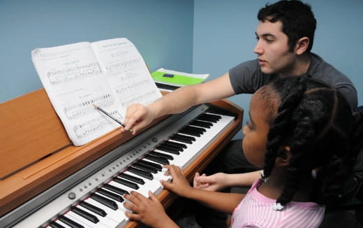 a person playing a piano