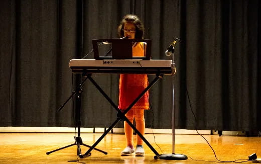 a person playing a piano