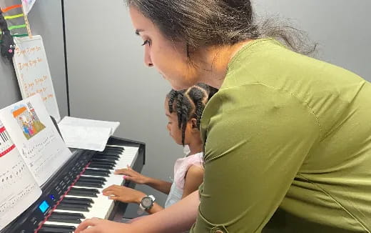 a man playing a piano