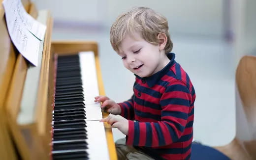 a child playing a piano