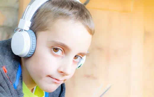 a boy wearing headphones