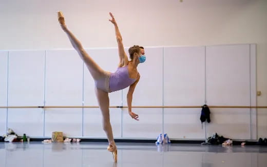 a woman doing gymnastics