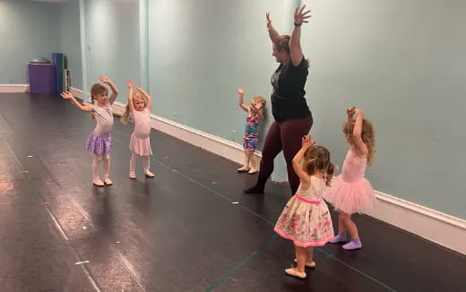 a group of children dancing