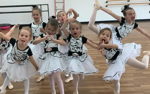 a group of girls dancing