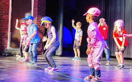 a group of children dancing