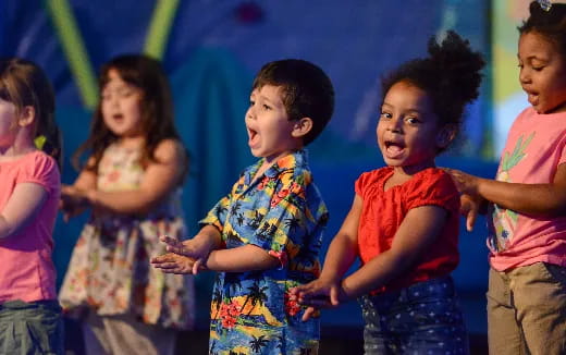 a group of children dancing