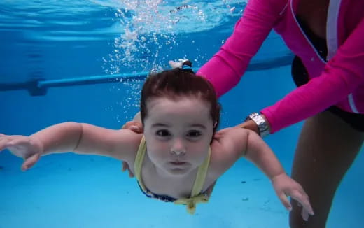 a woman in a pool