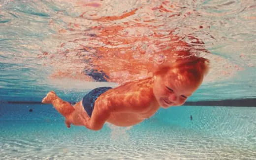 a person swimming in water