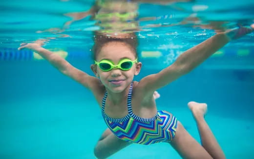 a child in a pool