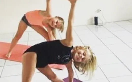 a couple of women exercising