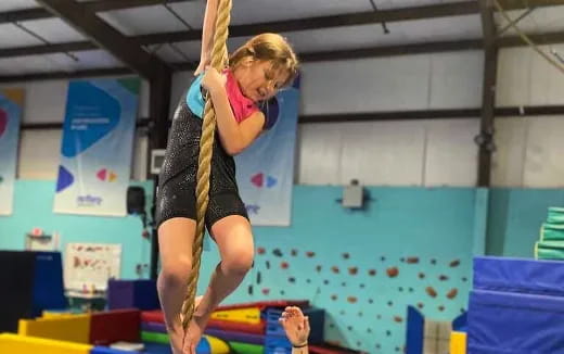 a woman performing gymnastics