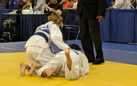 two people in karate uniforms