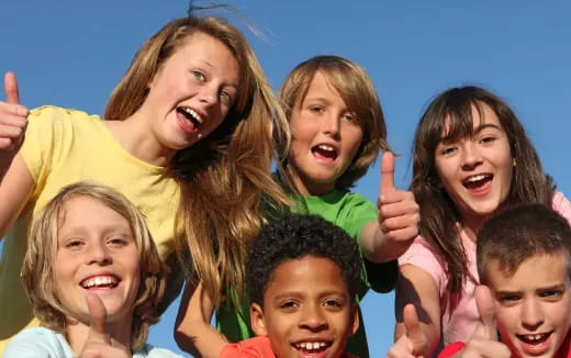 a group of children smiling