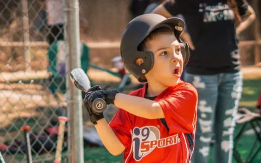 a young boy playing baseball