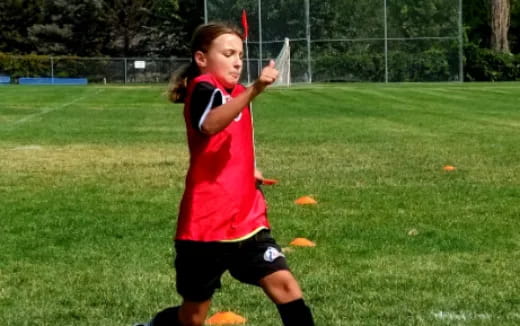 a girl playing football