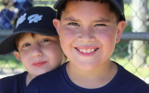 a couple of boys smiling